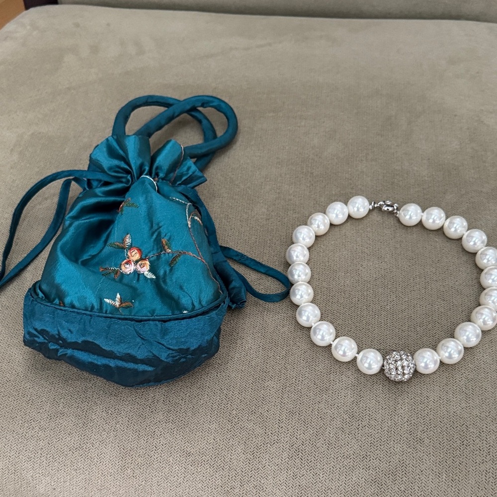 Teal Embroidered Drawstring Bag with Pearl Necklace